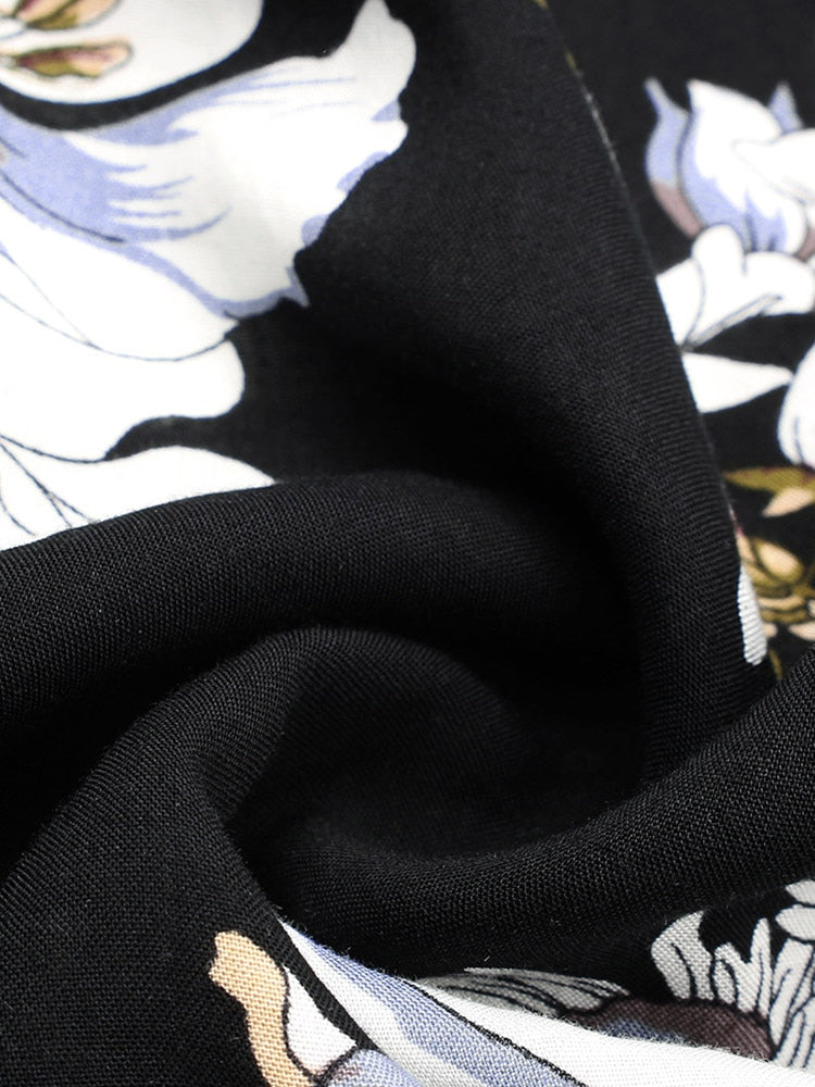 Langes Kleid mit Blume | La Parisienne