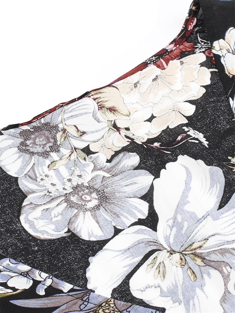 Langes Kleid mit Blume | La Parisienne